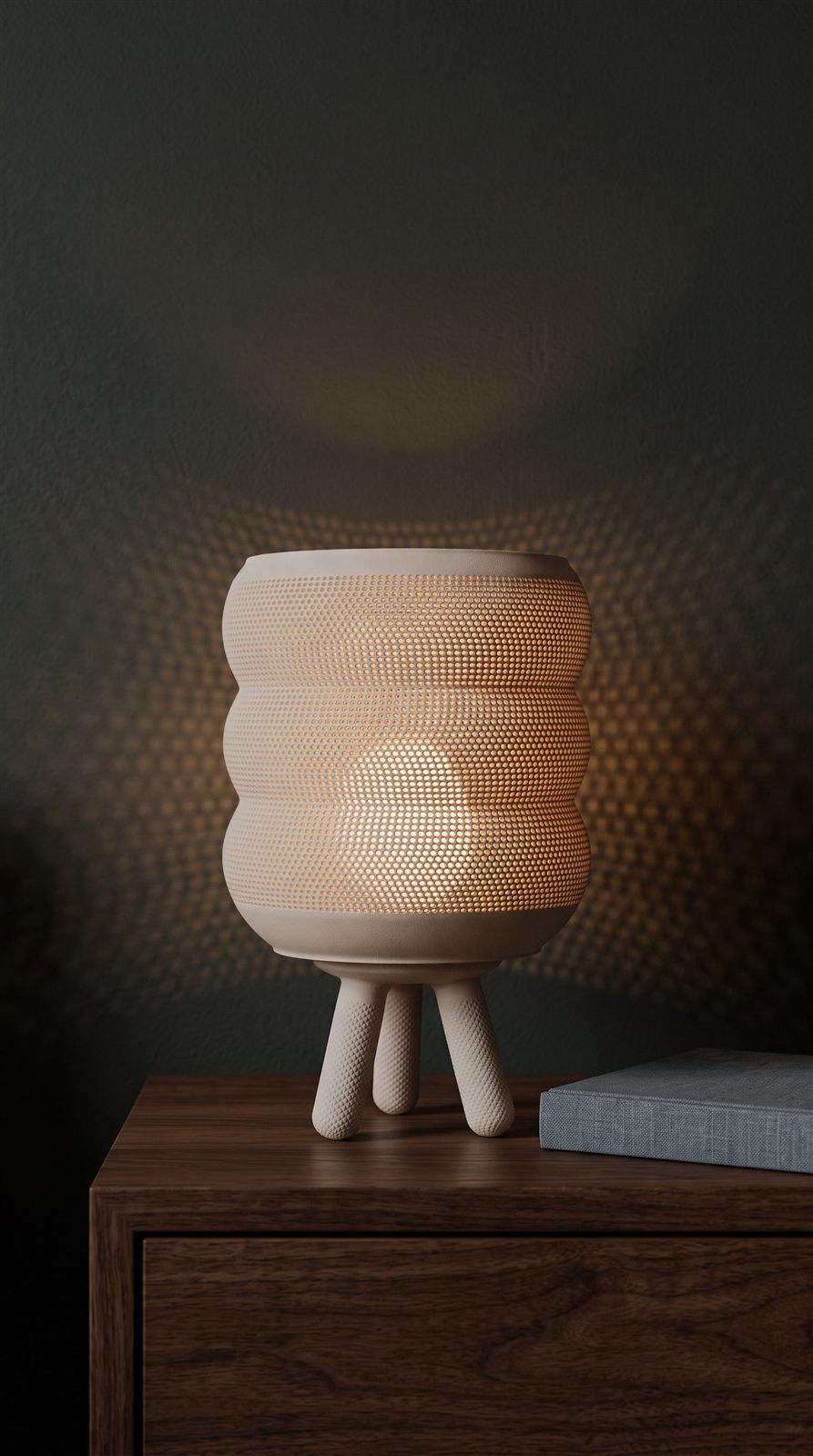 RIDGE lamp lit at night on a walnut dresser